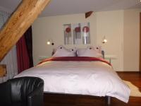 Postel nebo postele na pokoji v ubytování Hotel Metzgern