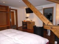 Postel nebo postele na pokoji v ubytování Hotel Metzgern
