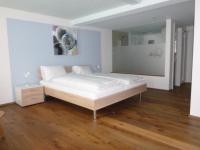 Postel nebo postele na pokoji v ubytování Hotel Metzgern