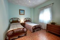 Cama o camas de una habitación en Casas Rurales Carroyosa del Jerte