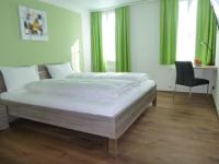Postel nebo postele na pokoji v ubytování Hotel Metzgern