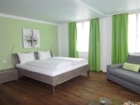 Postel nebo postele na pokoji v ubytování Hotel Metzgern