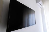 Maison Ortigiaにあるテレビまたはエンターテインメントセンター