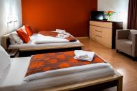 Postel nebo postele na pokoji v ubytování Hotel Bystricka