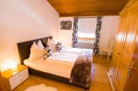 Posteľ alebo postele v izbe v ubytovaní Rodlers Chalet