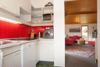 Kuchyňa alebo kuchynka v ubytovaní Rodlers Chalet