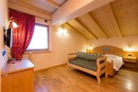 Posteľ alebo postele v izbe v ubytovaní Hotel Pontiglia