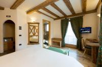 Posteľ alebo postele v izbe v ubytovaní Hotel Pontiglia