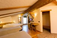 Posteľ alebo postele v izbe v ubytovaní Hotel Pontiglia