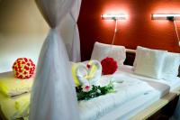Postel nebo postele na pokoji v ubytování Hotel Bystricka