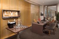 TV a/nebo společenská místnost v ubytování The Level at Melia Barcelona Sky