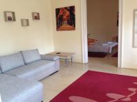 A bed or beds in a room at Péterfia Apartman