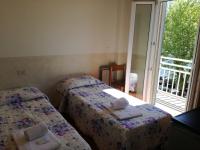 Posteľ alebo postele v izbe v ubytovaní Hotel Belvedere