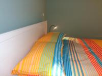 Postel nebo postele na pokoji v ubytování Ribeira Apartment