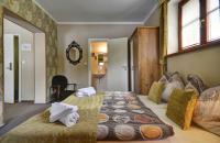 Postel nebo postele na pokoji v ubytování Hotel Stoh