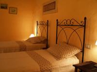 Posteľ alebo postele v izbe v ubytovaní Agriturismo La Roverella