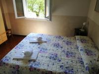 Posteľ alebo postele v izbe v ubytovaní Hotel Belvedere