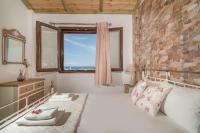 Postel nebo postele na pokoji v ubytování Ninemia Villa Zakinthos