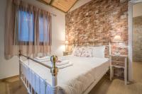Postel nebo postele na pokoji v ubytování Ninemia Villa Zakinthos