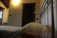 Posteľ alebo postele v izbe v ubytovaní Bed & Breakfast Triora Medievale