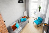 Posedenie v ubytovaní Lofts Cracow Apartments - City Center