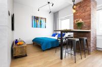 Posedenie v ubytovaní Lofts Cracow Apartments - City Center