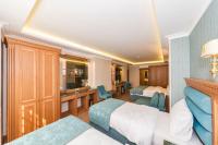 Postel nebo postele na pokoji v ubytování Magnaura House Hotel