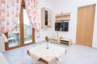 TV a/nebo společenská místnost v ubytování Apartments San Jozef