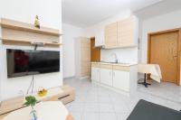 Kuchyň nebo kuchyňský kout v ubytování Apartments San Jozef