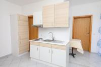 Kuchyň nebo kuchyňský kout v ubytování Apartments San Jozef