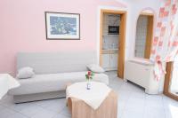 Kuchyň nebo kuchyňský kout v ubytování Apartments San Jozef
