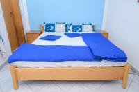 Postel nebo postele na pokoji v ubytování Apartments San Jozef