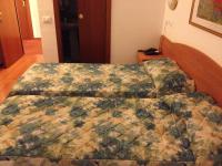 Posteľ alebo postele v izbe v ubytovaní Hotel Tirreno