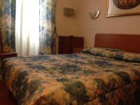 Posteľ alebo postele v izbe v ubytovaní Hotel Tirreno