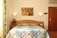 Posteľ alebo postele v izbe v ubytovaní Hotel Tirreno