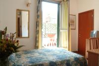 Posteľ alebo postele v izbe v ubytovaní Hotel Tirreno