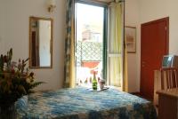 Posteľ alebo postele v izbe v ubytovaní Hotel Tirreno