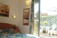 Posteľ alebo postele v izbe v ubytovaní Hotel Tirreno