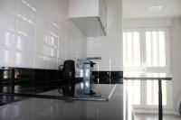 A kitchen or kitchenette at Cabo Mar Duplex