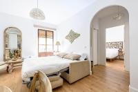 A bed or beds in a room at Apartamento Garcia Lorca III