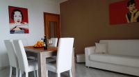 Posedenie v ubytovaní Loft Baia Di Giardini