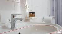 Kúpeľňa v ubytovaní Loft Baia Di Giardini
