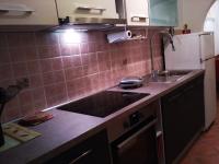 Kuchyň nebo kuchyňský kout v ubytování Apartman Nadia