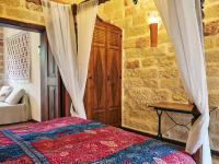Posteľ alebo postele v izbe v ubytovaní Helios Garden Boutique Apartments