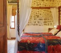 Posteľ alebo postele v izbe v ubytovaní Helios Garden Boutique Apartments