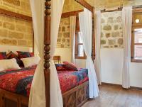 Posteľ alebo postele v izbe v ubytovaní Helios Garden Boutique Apartments