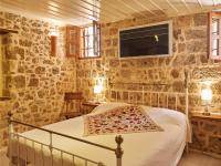 Posteľ alebo postele v izbe v ubytovaní Helios Garden Boutique Apartments