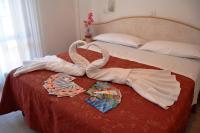 Posteľ alebo postele v izbe v ubytovaní Hotel Zenith
