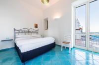 A bed or beds in a room at La Luella