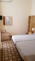 Postel nebo postele na pokoji v ubytování Hostal Eixample